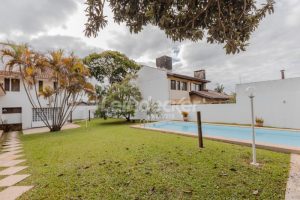 Casa Comercial para alugar com 306m², 4 dormitórios, 4 vagas no bairro Três Figueiras em Porto Alegre - Foto 37