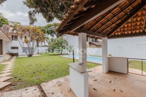 Casa Comercial para alugar com 306m², 4 dormitórios, 4 vagas no bairro Três Figueiras em Porto Alegre - Foto 39