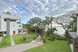 Casa em Condomínio para alugar com 334m², 3 dormitórios, 3 vagas no bairro Pedra Redonda em Porto Alegre - Foto 34