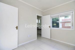 Casa em Condomínio para alugar com 125m², 3 dormitórios, 2 vagas no bairro Hipica em Porto Alegre - Foto 11
