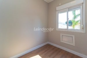 Casa para alugar com 103m², 2 dormitórios, 1 vaga no bairro Camaqua em Porto Alegre - Foto 17