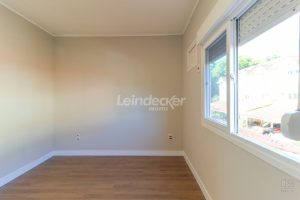 Casa para alugar com 103m², 2 dormitórios, 1 vaga no bairro Camaqua em Porto Alegre - Foto 23