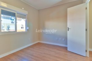 Casa para alugar com 103m², 2 dormitórios, 1 vaga no bairro Camaqua em Porto Alegre - Foto 25