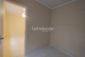 Casa para alugar com 97m², 2 dormitórios, 1 vaga no bairro Teresópolis em Porto Alegre - Foto 18