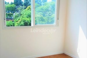 Apartamento à venda com 53m², 2 dormitórios, 1 suíte, 1 vaga no bairro Azenha em Porto Alegre - Foto 2