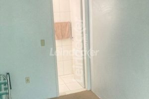 Casa à venda com 219m², 3 dormitórios, 6 vagas no bairro Passo d'Areia em Porto Alegre - Foto 14