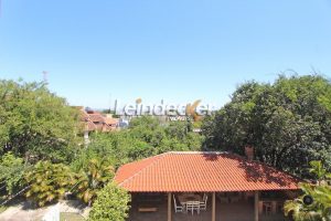 Casa à venda com 486m², 3 dormitórios, 1 suíte, 4 vagas no bairro Ipanema em Porto Alegre - Foto 9