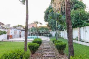 Casa à venda com 218m², 3 dormitórios, 2 suítes, 4 vagas no bairro Partenon em Porto Alegre - Foto 42