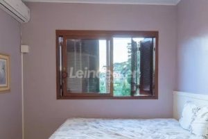 Casa à venda com 218m², 3 dormitórios, 2 suítes, 4 vagas no bairro Partenon em Porto Alegre - Foto 21