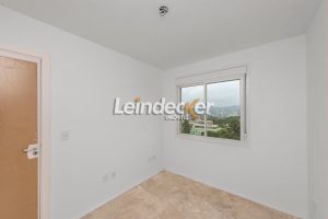 Apartamento à venda com 62m², 2 dormitórios, 1 suíte, 2 vagas no bairro Jardim do Salso em Porto Alegre - Foto 3