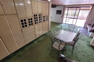 Casa à venda com 318m², 4 dormitórios, 2 suítes, 5 vagas no bairro Três Figueiras em Porto Alegre - Foto 17
