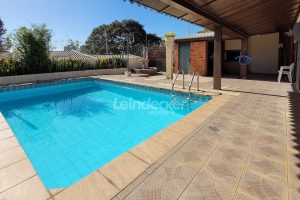 Casa à venda com 318m², 4 dormitórios, 2 suítes, 5 vagas no bairro Três Figueiras em Porto Alegre - Foto 26