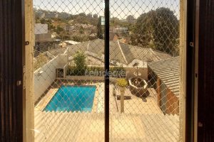 Casa à venda com 318m², 4 dormitórios, 2 suítes, 5 vagas no bairro Três Figueiras em Porto Alegre - Foto 66