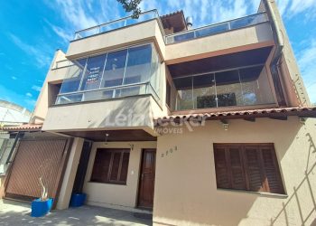 Casa para alugar com 323m², 5 dormitórios, 2 vagas no bairro Cavalhada em Porto Alegre