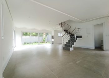 Casa em Condomínio para alugar com 300m², 3 dormitórios, 3 vagas no bairro Pedra Redonda em Porto Alegre