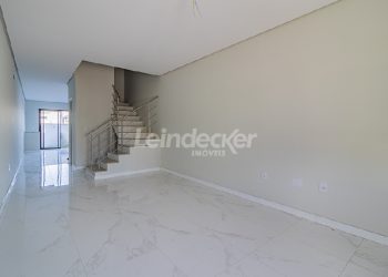 Casa para alugar com 108m², 2 dormitórios, 1 vaga no bairro Hipica em Porto Alegre