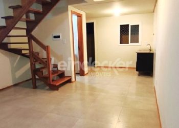 Casa para alugar com 56m², 2 dormitórios, 1 vaga no bairro Ponta Grossa em Porto Alegre