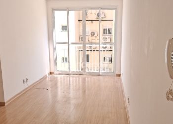 Apartamento à venda com 57m², 2 dormitórios, 1 suíte, 1 vaga no bairro Vila Nova em Porto Alegre